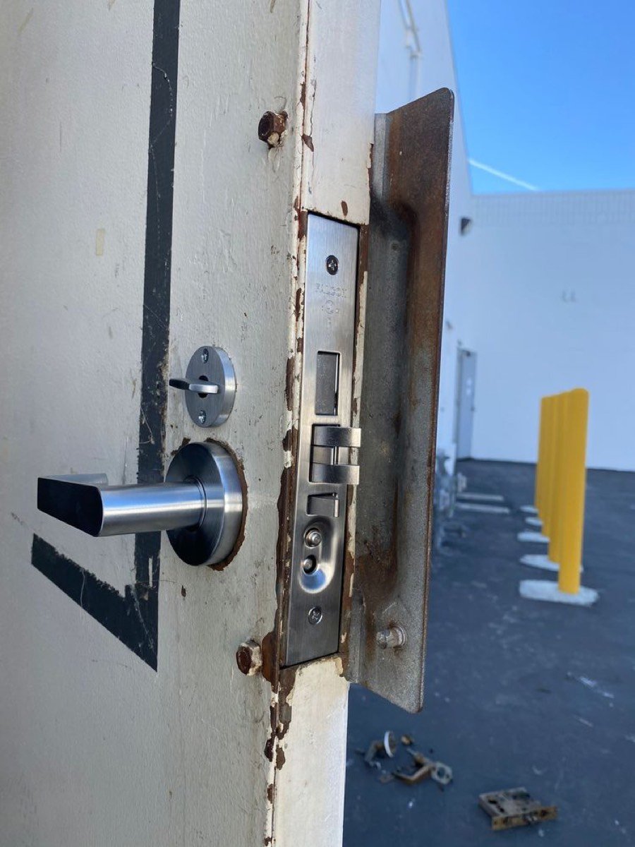 Commercial mortise lock replacement on a business door in Fort Lauderdale